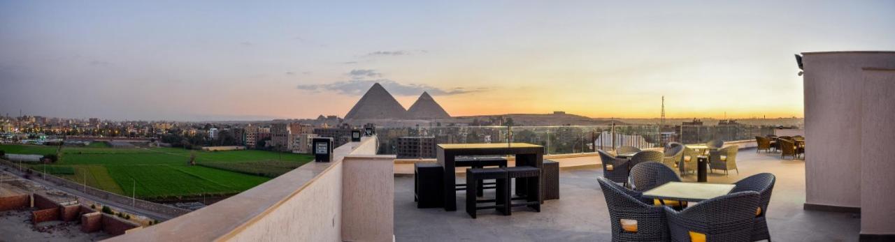 New Pyramid Quen Hotel Le Caire Extérieur photo