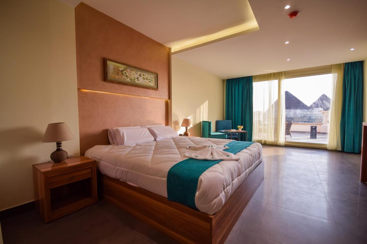 New Pyramid Quen Hotel Le Caire Extérieur photo